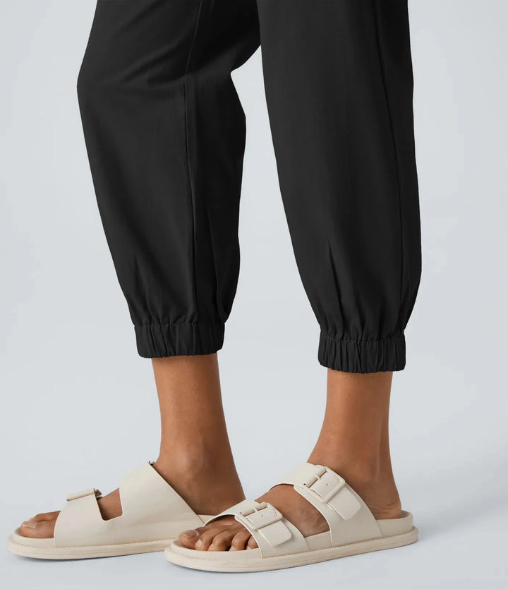 Elso - Casual cotton jogging pants with a mid-rise waist, button placket, zip fly and side pocket